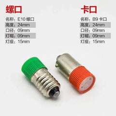 Two small BA9S LED lamp bead indicator bulbs with green and orange caps, metal bases, 24mm height, 9mm diameter.