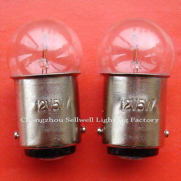 Two 12V 5W double-point bayonet lamp holders BA15D miniature light bulbs on red background
