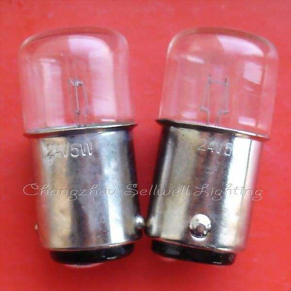 Two double-point bayonet lamp holders BA15D miniature light bulbs on red background