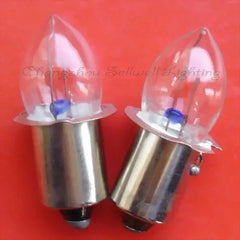 10pcs Krypton light A692 pilot indicator bulbs with clear glass covers and metal bases on red background